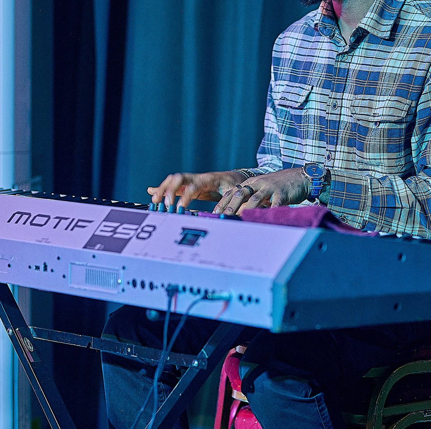 Mike Splendour playing a Yamaha Motif keyboard
